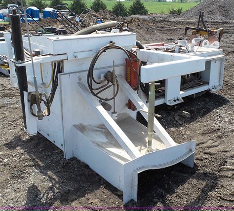 curb machine attachment for skid steer|offset skid steer attachments.